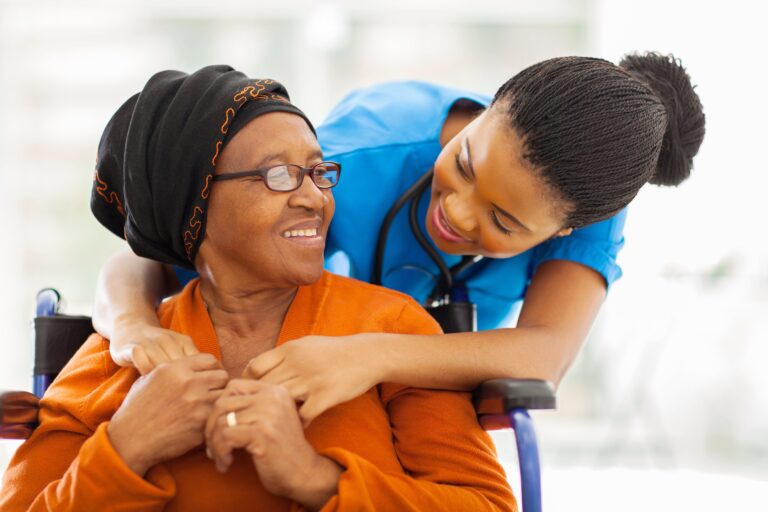 caretaker caring for elderly woman
